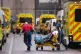 Paramedics unload a patient from an ambulance outside the Ro