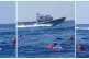 An Armed Forces Malta (AFM) ship cruises at high speeds near
