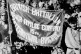 Members of the British Battalion, Major Attlee Company, 15th International Brigade, displaying their banner during a lull in the fighting during the Spanish Civil War of 1936-1939