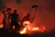 Firefighters tackle a wild fire on Winter Hill near Bolton, June 2018