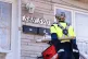 A Canada Post mail carrier delivers mail and packages on their route in Montreal, November 13, 2024