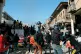 FRACTURED NATION: Anti-government protesters hurl stones during clashes in Baghdad, November 2019, making calls to sweep aside Iraq’s sectarian state system