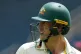 Australia's captain Pat Cummins walks of the field, bowled by West Indies' Alzarri Joseph, on day three of the third Test cricket match at Sabina Park in Kingston, Jamaica, July 14, 2025