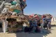 Afghan refugees sit next to their belongings loaded onto vehicles as they wait for opening of the border crossing point, which closed following Afghan and Pakistani security forces exchanged cross border firing, at a camp in Chaman, Pakistan, October 12, 2025