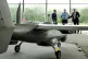 WARFARE NOT WELFARE: Defence Secretary John Healey (red tie) is shown the Tekever AR5 drone during a visit to Tekever's new military drone production facility, part of an expansion of the country's defence manufacturing capabilities, in Swindon, Wiltshire in September 2025