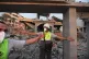Civil defense members cordon off the area around a building destroyed by an Israeli airstrike in the village of Teir Debba, southern Lebanon, Thursday, Nov. 6, 2025