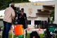 Journalists work at the entrance of the federal police headquarters, where former President Jair Bolsonaro is being held, in Brasilia, Brazil, November 23, 2025