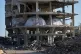 Tents are set up inside a gutted apartment building in Khan Younis, in the southern Gaza Strip, November 15, 2025