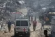 Members of the International Committee of the Red Cross (ICRC) arrive at the site where Hamas militants are searching for the remains of hostages in Jabalia, northern Gaza Strip, December 1, 2025