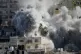 Smoke rises as Israeli forces demolish the home of Abdul Karim Sanoubar in Nablus, West Bank, December 2, 2025