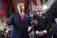 President Donald Trump, center, speaking to members of the media during his arrival with FIFA President Gianni Infantino, right, at the Kennedy Center for the 2026 FIFA World Cup draw, Friday, Dec. 5, 2025, in Washington