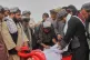Afghans prepare the body of a man killed during an overnight exchange of fire between Afghan and Pakistani forces along the border in Spin Boldak, Kandahar province, Afghanistan, December 6, 2025