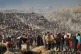 Hamas militants and Egyptian workers accompanied by members of the International Committee of the Red Cross (ICRC) head to Zeitoun neighbourhood of Gaza City to search for the remains of deceased hostages, December 8, 2025