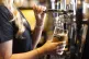 A pint being pulled at a pub in London, Dcember 2024