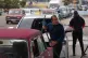 SHORTAGES: A driver refuels others wait in a long line behind to fill up at a petrol station in Havana, Cuba, Tuesday, January 27