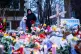       People pay their respects at a memorial honoring a woman who was fatally shot by an Immigration and Customs Enforcement officer the day before, near the site of the shooting in Minneapolis, January 8, 2026