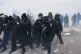 Federal immigration officers confront protesters outside Bishop Henry Whipple Federal Building in Minneapolis, January 15, 2026