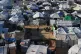 Displaced Palestinians gather outside a tent at a temporary camp in Deir al-Balah, central Gaza Strip, January 17, 2026