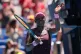 Victoria Mboko of Canada waves after defeating Clara Tauson of Denmark in their third round match at the Australian Open tennis championship in Melbourne, Australia, January 23, 2026