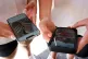 Young people use their phones to view social media in Sydney, November 8, 2024