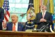 President Donald Trump (left) gets a reaction from Britian's ambassador to the United States Peter Mandelson (right), in the Oval Office of the White House, May 8, 2025, in Washington
