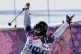 Gus Kenworthy celebrates at the end of his second run in the men's ski slopestyle final at the Rosa Khutor Extreme Park at the 2014 Winter Olympics, in Krasnaya Polyana, Russia, February 13, 2014