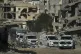 A UN vehicle escorts ambulances and a bus carrying Palestinian patients in Khan Younis as they travel to the Rafah crossing to leave the Gaza Strip for medical treatment abroad, February 3, 2026