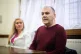 Former bus driver Mark Hehir (right) and Katalin Kaszas, the victim of the robbery, speak with shadow minister for justice Kieran Mullan in the House of Commons, London, February 3, 2026