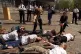 The scene outside the Queen Elizabeth Conference Centre, in central London, as members from the Campaign Against Arms Trade (CAAT) protest against British Aerospace's sale of arms to world hot spots, including Indonesia, April 1999