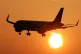 An easyJet plane coming in to land at London Gatwick Airport as the sun rises over Crawley, West Sussex, February 17, 2025