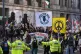 People take part in a Palestine Coalition march in central London, January 31, 2026