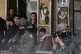 Israeli soldiers aim their weapons during a military operation at a market in the Balata refugee camp in the West Bank, as Palestinians stand nearby, February 1, 2026