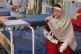 A girl, who was injured in the overnight cross border fighting between Pakistan and Afghan forces, receives treatment at a hospital at Khar, in Bajaur, a district of Pakistan's Khyber Pakhtunkhwa province bordering with Afghanistan, February 27, 2026
