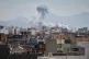 A plume of smoke rises after a strike in Tehran, Iran, March 2, 2026