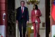 Venezuela's acting President Delcy Rodriguez (right) and US Interior Secretary Doug Burgum walk after a meeting at Miraflores presidential palace in Caracas, Venezuela, March 4, 2026