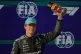 Mercedes driver George Russell of Britain celebrates his pole position for the sprint qualifying ahead of the Chinese Formula One Grand Prix race in Shanghai, China, March 13, 2026
