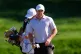 Rory McIlroy of Northern Ireland reacts to his shot in the 2nd green during the third round of The Players Championship golf tournament, March 14, 2026, in Ponte Vedra Beach, Fla. 