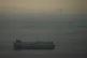 Cargo ships sail in the Arabian Gulf towards Strait of Hormuz in United Arab Emirates, March 19, 2026