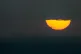 Ships sail through the Arabian Gulf toward the Strait of Hormuz as the sun sets in the United Arab Emirates, March 23, 2026