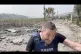 A screengrab of a video showing RT reporter Steve Sweeney under fire in Lebanon, March 19, 2026