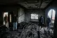 Palestinians inspect a torched house following Israeli settlers' rampage through nearby Nablus-area villages on Sunday night, in West Bank village of Deir al-Hatab, March 23, 2026