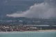 Smoke rises following an Israeli airstrike on the village of Henniyeh, as it is seen from the southern port city of Tyre, Lebanon, April 15, 2026