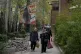 Women walk past a banner depicting the late Iranian Supreme Leader Ayatollah Ali Khamenei, who was killed in the U.S. and Israel strikes on Feb. 28, in northern Tehran, Iran, April 12, 2026