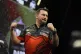 Jonny Clayton celebrates winning his match against Michael van Gerwen on night ten of the Premier League 2026 at the Brighton Centre, April 9, 2026