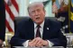 President Donald Trump speaks in the Oval Office of the White House before signing an executive order, March 31, 2026, in Washington