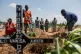 Relatives of Vanisa Anifa, a six-month-old orphaned girl who died of Ebola, attend her burial, in Bunia, Congo, June 19, 2026