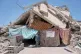ABANDONNED BY THE ‘CIVILISED’ WORLD: A member of the Abu Rish family stands in front of the entrance to her former house, in Khan Younis, southern Gaza Strip, destroyed by Israeli shelling, May 29 2026