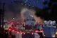 Police fire a water cannon towards rioters after they set fire to wheelie bins and removed a garden fence to use as a shield against the water cannon on Antrim Road, at the Sandyknowes roundabout in Newtownabbey, June 10, 2026