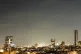 A projectile streaks through the sky over central Israel during an Iranian missile attack, June 7, 2026