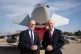 Prime Minister Keir Starmer (left) and Defence Secretary John Healey stand in front of a UK Typhoon fighter jet at Tusas airbase in Ankara, during a visit to Turkey, October 27, 2025
